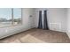 Bright bedroom with a large window offering lots of natural light at 15357 W Post Cir, Surprise, AZ 85374