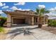 Inviting single-Gathering home with a well-maintained front yard and two car garage at 15357 W Post Cir, Surprise, AZ 85374