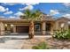 Inviting single-Gathering home with a well-maintained front yard and two car garage at 15357 W Post Cir, Surprise, AZ 85374
