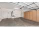 Spacious garage features a sink, water heater, and built-in cabinets at 15357 W Post Cir, Surprise, AZ 85374