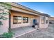 Covered back patio with grill and outdoor seating, perfect for entertaining and relaxing at 1612 E South Mountain Ave, Phoenix, AZ 85042