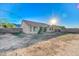 Expansive backyard with potential for outdoor activities, featuring a privacy fence and mountain views at 1612 E South Mountain Ave, Phoenix, AZ 85042