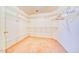 Spacious walk-in closet featuring wire shelving and carpeted floor at 1612 E South Mountain Ave, Phoenix, AZ 85042