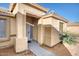 Inviting front entry showcasing well-kept landscaping and a secure screen door for added peace of mind at 1612 E South Mountain Ave, Phoenix, AZ 85042