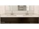 Double sink vanity with dark cabinets and a white countertop, perfect for a modern bathroom at 17449 W Eva St, Waddell, AZ 85355