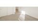 Bright bedroom with a carpet and two closets at 17449 W Eva St, Waddell, AZ 85355