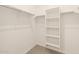 Bright, walk-in closet with built-in shelves and ample storage space at 17449 W Eva St, Waddell, AZ 85355