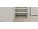 This storage area offers custom shelves for optimum organization and easy access to stored belongings at 17624 W Pierson St, Goodyear, AZ 85395