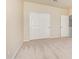 Bedroom features a neutral carpet, a closet with sliding doors, and neutral paint at 1870 E Indigo Dr, Chandler, AZ 85286