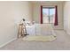 Bedroom with carpet flooring, a ceiling light, and a window at 1870 E Indigo Dr, Chandler, AZ 85286