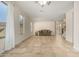 Spacious, open living area featuring tile flooring and large windows for ample light at 1870 E Indigo Dr, Chandler, AZ 85286