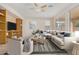 Staged living area showcasing a neutral palette, plush seating, and stylish decor at 1870 E Indigo Dr, Chandler, AZ 85286