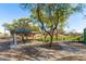 Shaded park pavilion with picnic tables next to playground and benches, perfect for gatherings and Gathering fun at 1870 E Indigo Dr, Chandler, AZ 85286
