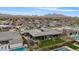 The aerial view showcases the large backyard with play area, covered patio, pool and mountain views at 19726 E Vallejo St, Queen Creek, AZ 85142