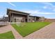 Spacious backyard with artificial turf, sport nets and gravel landscaping at 19726 E Vallejo St, Queen Creek, AZ 85142