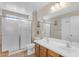 Bathroom featuring a double sink vanity and sliding door shower at 2635 W Angel Way, San Tan Valley, AZ 85144