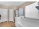 Bathroom with a bathtub and shower combination, and storage space at 2635 W Angel Way, San Tan Valley, AZ 85144
