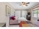 Spacious bedroom with natural light, carpet, and large dresser at 2635 W Angel Way, San Tan Valley, AZ 85144