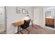 Office space featuring wood desk, comfortable chair, and ample lighting for a productive work environment at 2724 S Chaparral Rd, Apache Junction, AZ 85119
