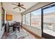 Cozy sun room with dining table and comfortable seating area with backyard views at 2724 S Chaparral Rd, Apache Junction, AZ 85119
