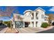 Elegant stucco home with a private garage and balcony offers modern living and beautiful architectural details at 295 N Rural Rd # 259, Chandler, AZ 85226