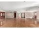 Expansive living room featuring ceramic tile flooring, neutral walls, and recessed lighting at 3135 W Echo Ln, Phoenix, AZ 85051