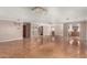 Spacious living room with ceramic tile, neutral walls, recessed lights, and open floor plan at 3135 W Echo Ln, Phoenix, AZ 85051