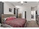 Bedroom featuring carpeted floors, neutral paint and an ensuite bathroom at 4051 S 243Rd Dr, Buckeye, AZ 85326