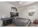 Comfortable bedroom with carpeted floors, neutral paint and a serene atmosphere at 4051 S 243Rd Dr, Buckeye, AZ 85326