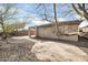 The property includes a spacious backyard with a covered patio, desert landscaping and stone pathway at 41309 N Belfair Way, Anthem, AZ 85086