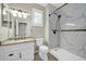 Updated bathroom with white vanity, marble shower, and modern fixtures at 41309 N Belfair Way, Anthem, AZ 85086