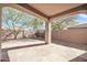 The property boasts a covered patio with desert landscaping, stone accents, and privacy walls at 41309 N Belfair Way, Anthem, AZ 85086