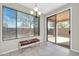 Cozy dining area with large windows providing ample natural light and access to the outdoor patio at 41309 N Belfair Way, Anthem, AZ 85086