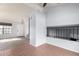 Bright living room showcasing neutral walls and tile flooring, complemented by natural light and open floorplan at 434 E Rosemonte Dr, Phoenix, AZ 85024