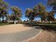 Community park featuring mature trees, playground, offering a serene environment for recreation at 4799 E Meadow Lark Way, San Tan Valley, AZ 85140