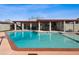 Beautiful pool with an outdoor covered seating area, perfect for enjoying the backyard at 4901 W Beverly Ln, Glendale, AZ 85306