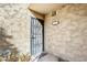Front door of house with security gate and decorative accents at 4950 N Miller Rd # 135, Scottsdale, AZ 85251