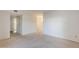 Clean and bright living room with carpet and neutral walls at 4950 N Miller Rd # 135, Scottsdale, AZ 85251