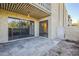 View of the patio with a sliding glass doors leading to the interior at 4950 N Miller Rd # 135, Scottsdale, AZ 85251