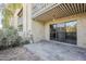 Private outdoor patio and balcony with stone flooring at 4950 N Miller Rd # 135, Scottsdale, AZ 85251