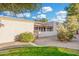 Backyard featuring desert landscaping, a privacy wall, and view of a covered patio at 6270 N 78Th St # 323, Scottsdale, AZ 85250
