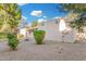 Backyard featuring desert landscaping, a privacy wall, and view of a covered patio at 6270 N 78Th St # 323, Scottsdale, AZ 85250