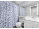 Bathroom with a white vanity and a jellyfish themed shower curtain at 6270 N 78Th St # 323, Scottsdale, AZ 85250
