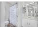 Bright bathroom featuring a shower with decorative curtain and a vanity with ample storage at 6270 N 78Th St # 323, Scottsdale, AZ 85250
