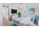 Serene bedroom featuring a plush bed, tasteful decor, and a ceiling fan for added comfort and style at 6270 N 78Th St # 323, Scottsdale, AZ 85250