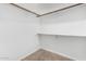 Walk-in closet featuring white walls and a shelf and closet rod for plenty of storage at 6270 N 78Th St # 323, Scottsdale, AZ 85250