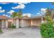 Charming single story home featuring a covered carport with storage, a front patio, and mature landscaping at 6270 N 78Th St # 323, Scottsdale, AZ 85250