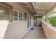 Covered patio with access to the backyard and view of an adjacent building at 6270 N 78Th St # 323, Scottsdale, AZ 85250