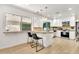 Bright, updated kitchen featuring white cabinets, granite countertops, and stainless steel appliances at 7028 N 12Th Way, Phoenix, AZ 85020
