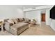 Cozy living room with comfortable seating and a neutral color scheme at 7028 N 12Th Way, Phoenix, AZ 85020